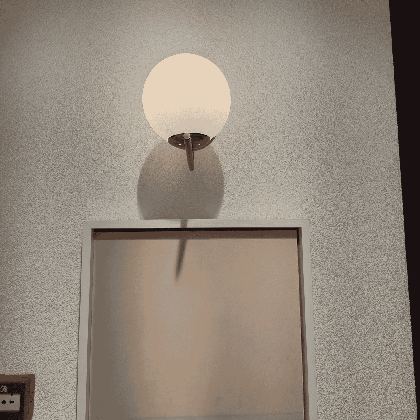 Brass Bathroom Wall Sconce with Frosted Globe – Modern Vanity Light, Minimalist Hardwired Fixture for Mirror or Sink Area