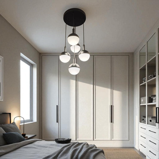 Bedroom with a modern five-globe ceiling pendant providing soft ambient light.