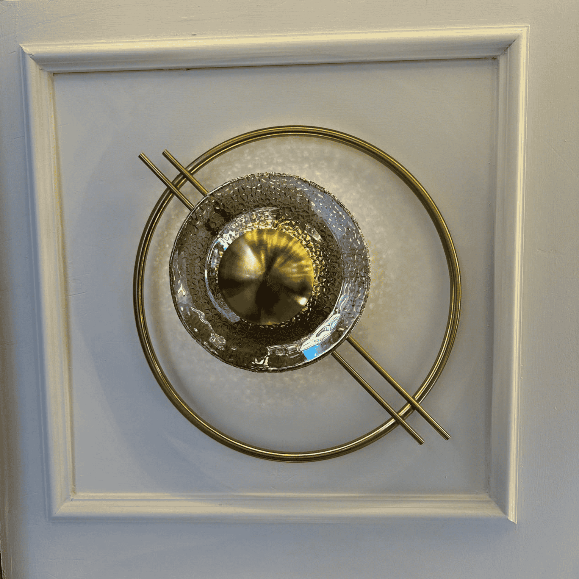 Sculptural brass and textured glass wall light, ideal for stairway use in Art Deco or Mid-Century Modern homes.