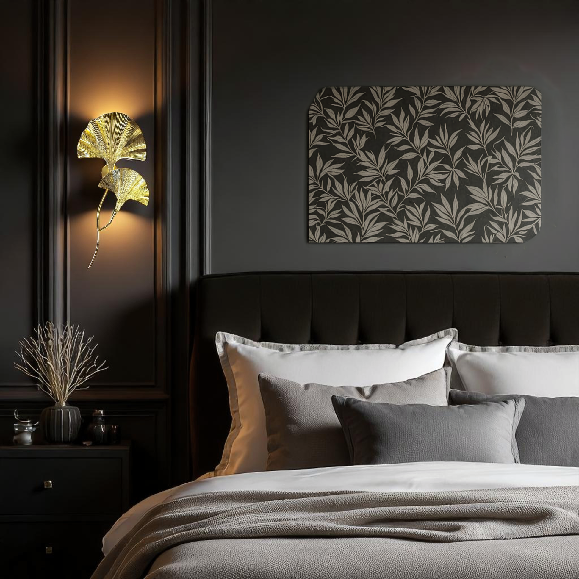 Gold leaf-shaped wall sconce mounted beside bed with botanical wallpaper above headboard in luxury bedroom