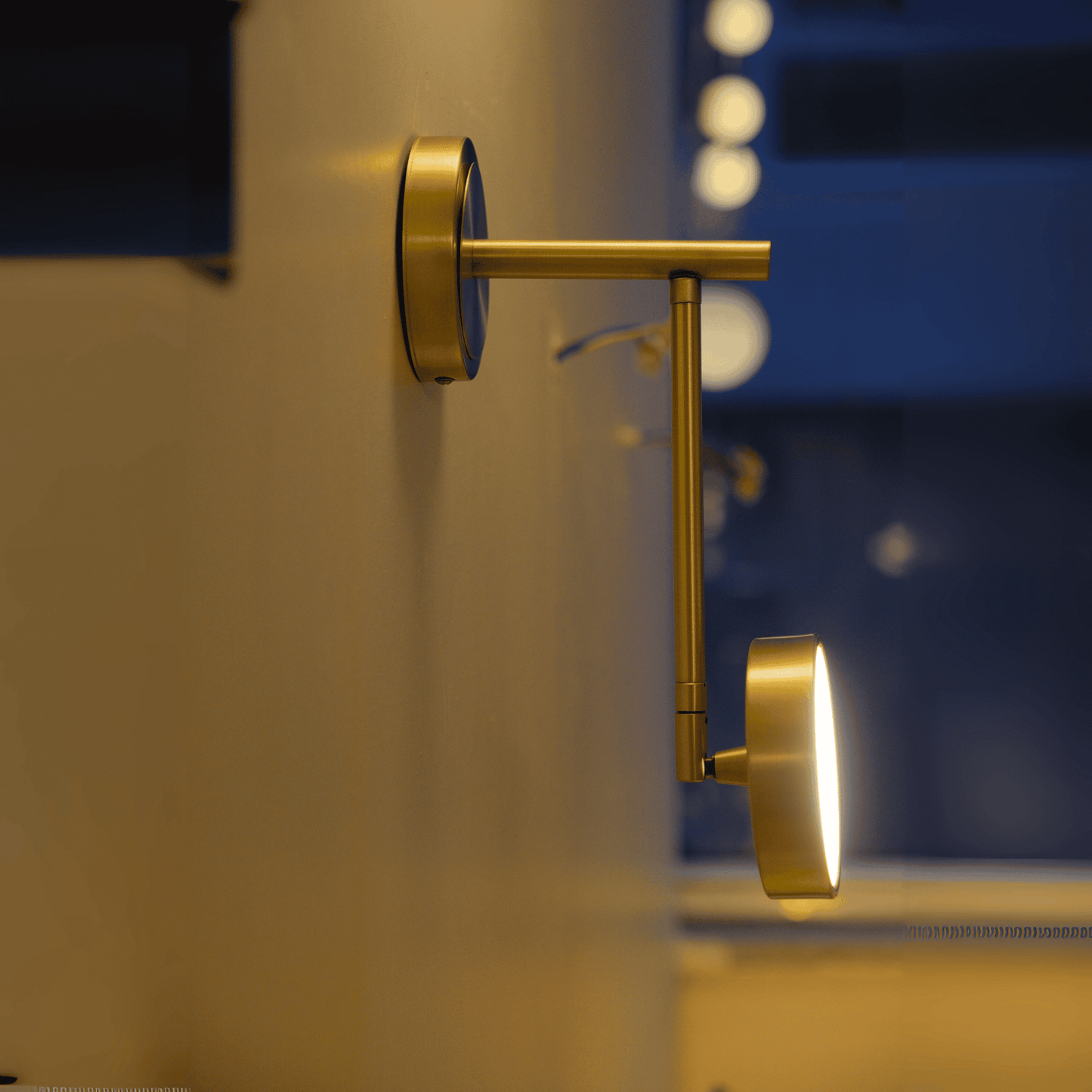 Modern Brass Wall Sconce with Adjustable Arm