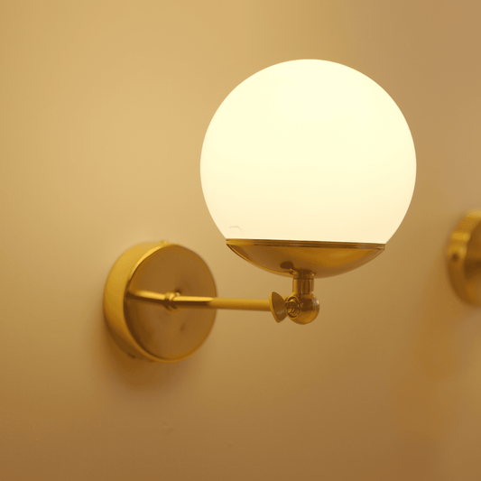 Modern Globe Wall Sconce with Adjustable Arm