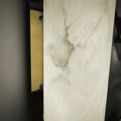 Detailed close-up of alabaster wall sconce showing texture and brass hardware.
