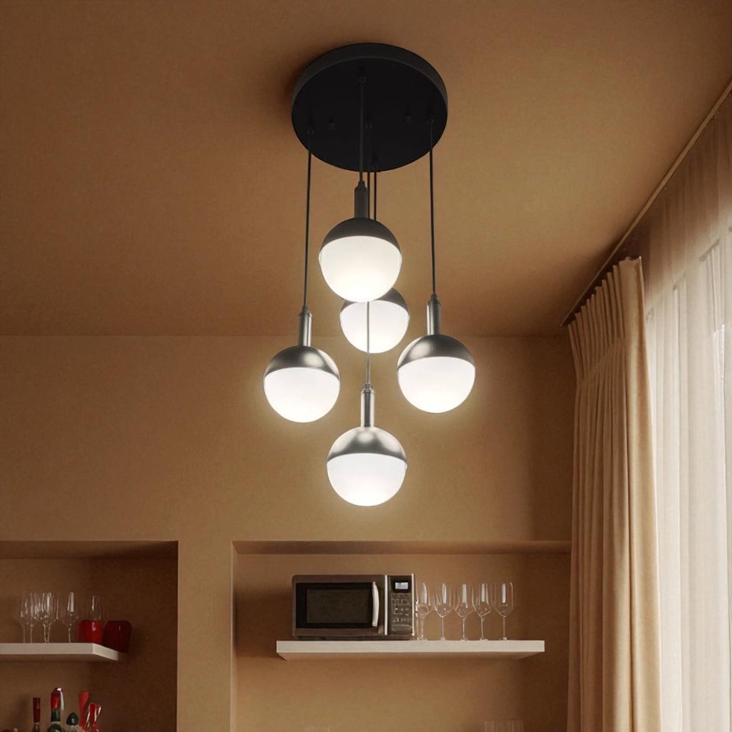 Bar area with globe pendant lighting creating a warm modern atmosphere.