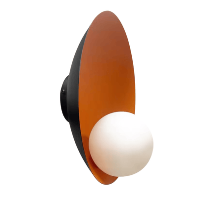 Wall-mounted sconce with orange reflector and frosted glass globe