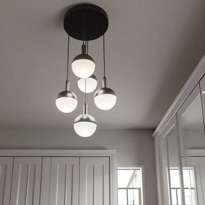Hallway with modern globe pendant lighting and built-in wardrobe design.