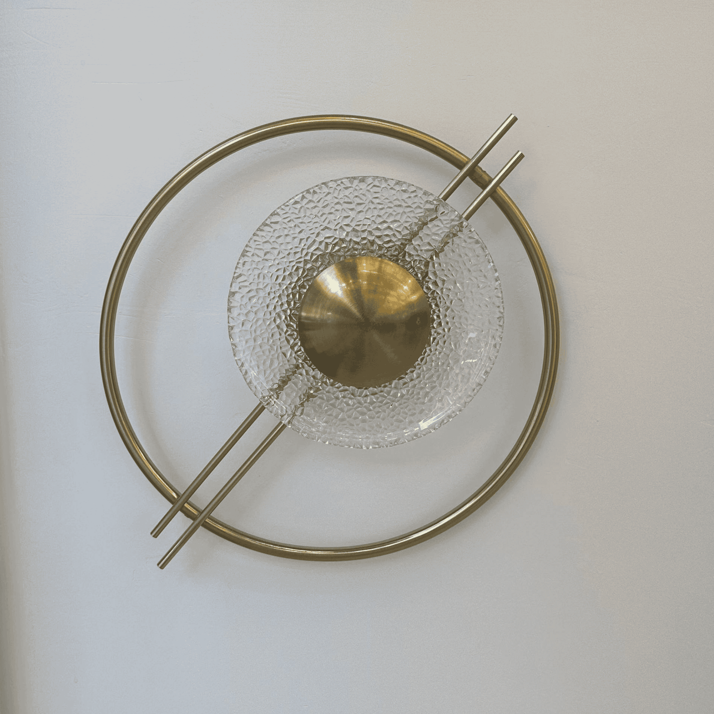 Art Deco circular wall light with brass and textured glass, perfect for Mid-Century Modern stairway lighting.